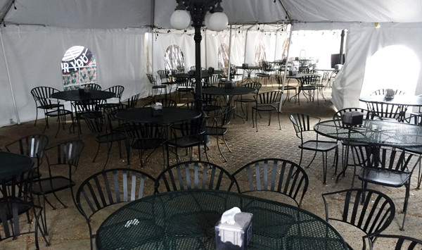 Inside the tents at Parkside Pub, tables await diners and drinkers looking for some conviviality during the age of COVID. State rules would require two of the tents’ four walls to be rolled up while diners are present.