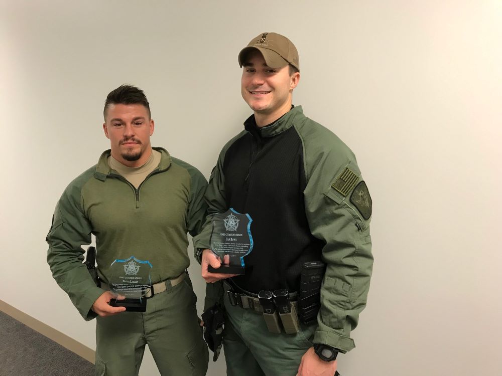 Huntley Police Officers Brock Larkin and Daniel Rowe presented with awards on behalf of the Kane County SWAT team in 2018