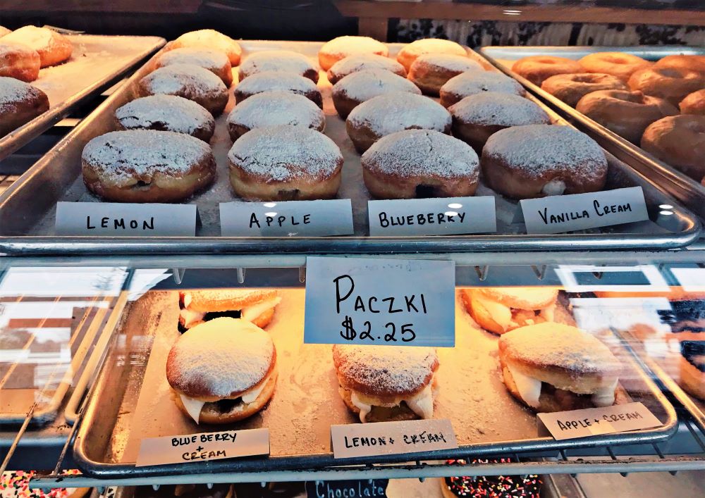 Roll N Donut Cafe & Douangchay's Kitchen sells a variety paczki on Fat Tuesday