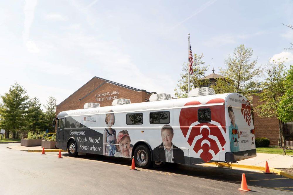 Heartland Blood Donors coach bus sets up at the Algonquin Public Library District for their blood drive event.