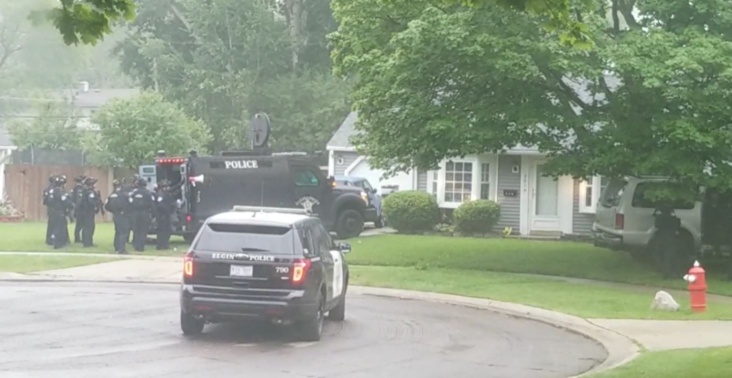 Elgin Police Department take Victor Ayllon into custody at a house in the Laurel Court area in Streamwood