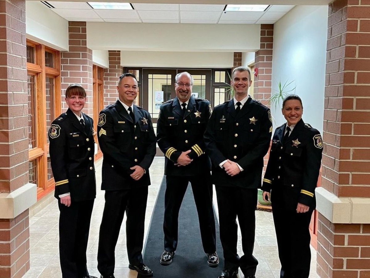 Sergeants Ryan Gregorio (Left) and Tim Heagney (Right) were promoted to their new ranks at the Jan. 13 Village Board meeting by Huntley Police Chief Robert Porter (Center)