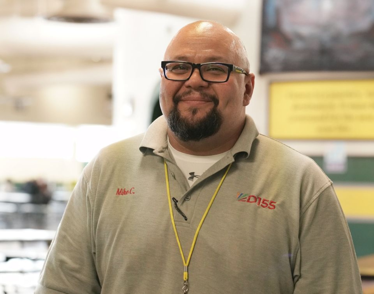 Crystal Lake South High School Custodian Mike Cruz saved student Alexis Bennett's life when she choked on food while eating her lunch