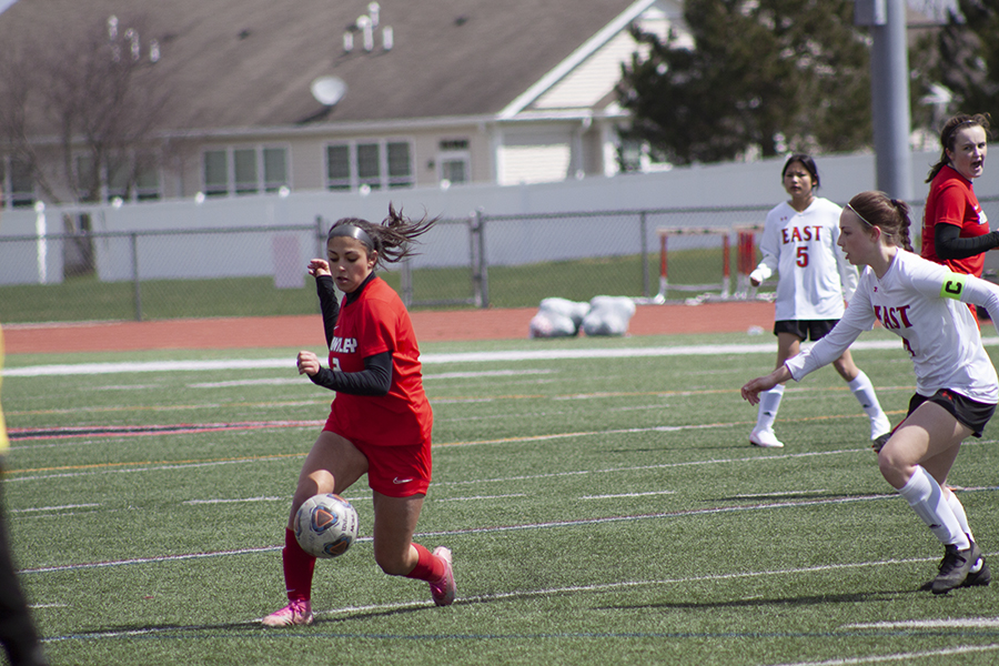 Huntley girls soccer's Gabrielle Farraj battles an opponent in a match earlier this season. HHS will host a regional tournament.