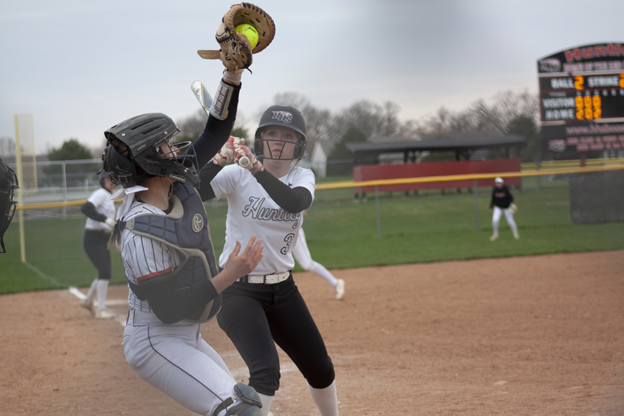 Huntley junior Madison Smith takes a high pitch just before she hit a home run against McHenry. Smith leads HHS with four home runs.