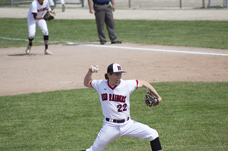 Huntley senior Adam Guazzo fires a pitch during the Red Raiders' 18-1 win over Rockford Harlem for the Class 4A De Kalb Regional championship May 28.