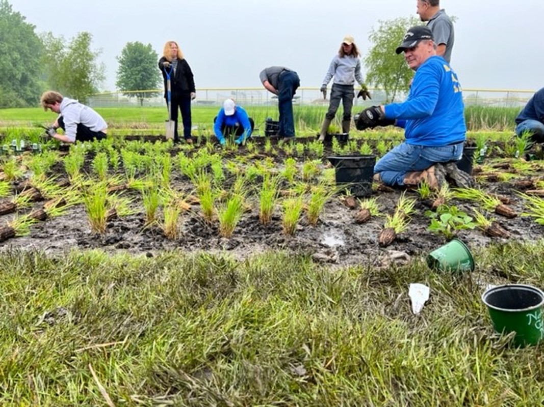 LITH village officials, members of the Rotary Club of LITH, and community volunteers worked together to plant a 1,400 square foot garden