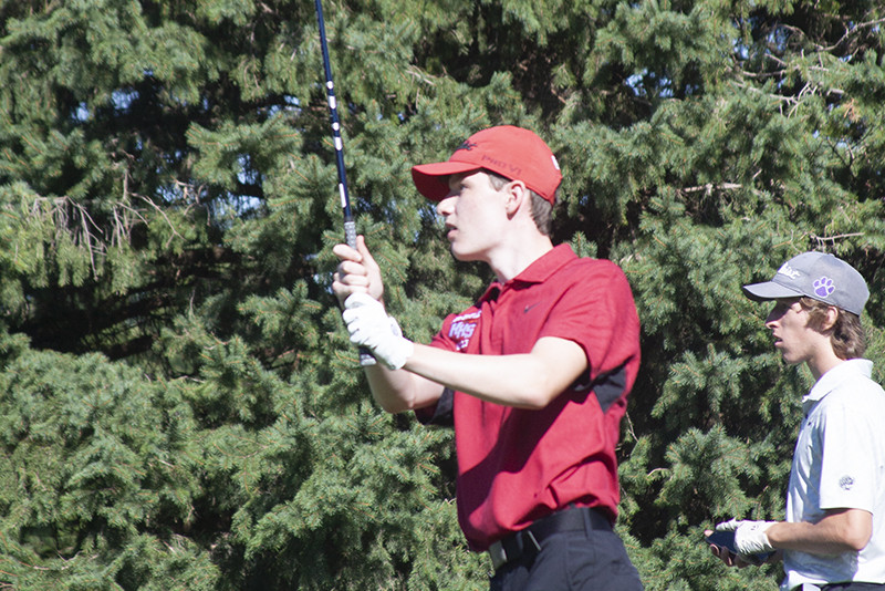 Huntley senior Brendan Busky hits a tee shot during the Crystal Lake South Invite Aug. 11 at Boulder Ridge Country Club.