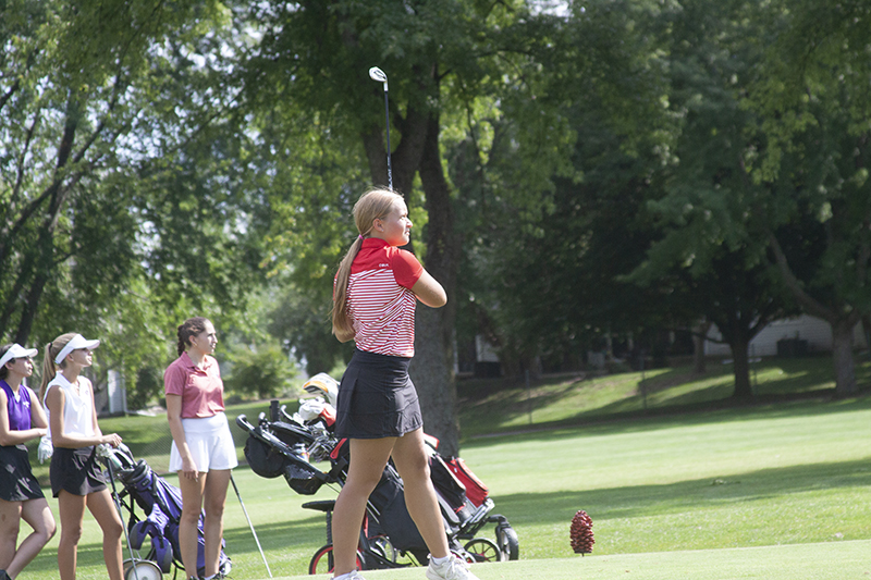 Huntley junior golfer Aubrey Dingbaum concentrates on a tee shot at Huntley's invitational Aug. 18 at Pinecresr Golf Club.