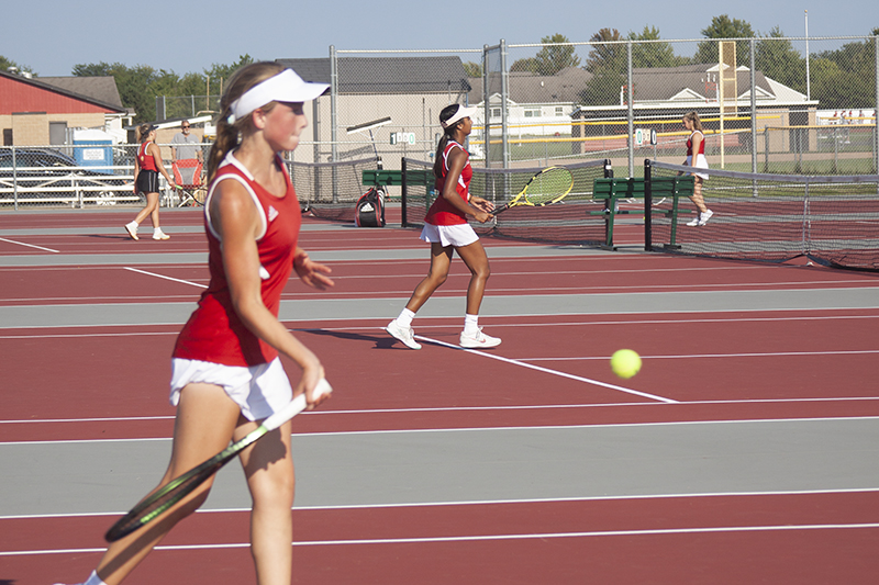 Huntley's Ella Doughty battles in her No. 1 singles match against Batavia at HHS Aug. 24.