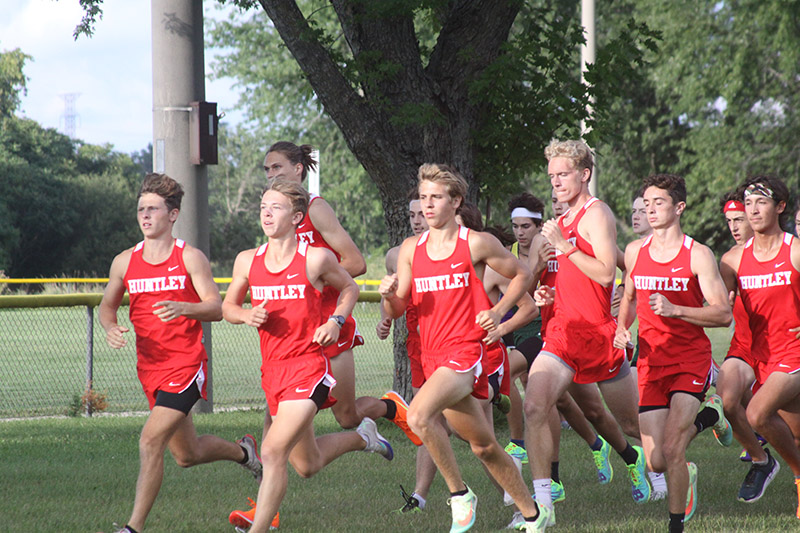 Huntley's boys cross-country team begins the course at Lippold Park in a double dual Sept. 6.