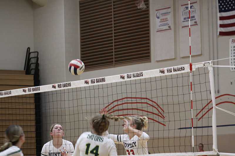 Huntley's Avary DeBlieck, left and Ally Panzloff battle at the net against Crystal Lake South Sept. 20. HHS won 25-16, 25-18.