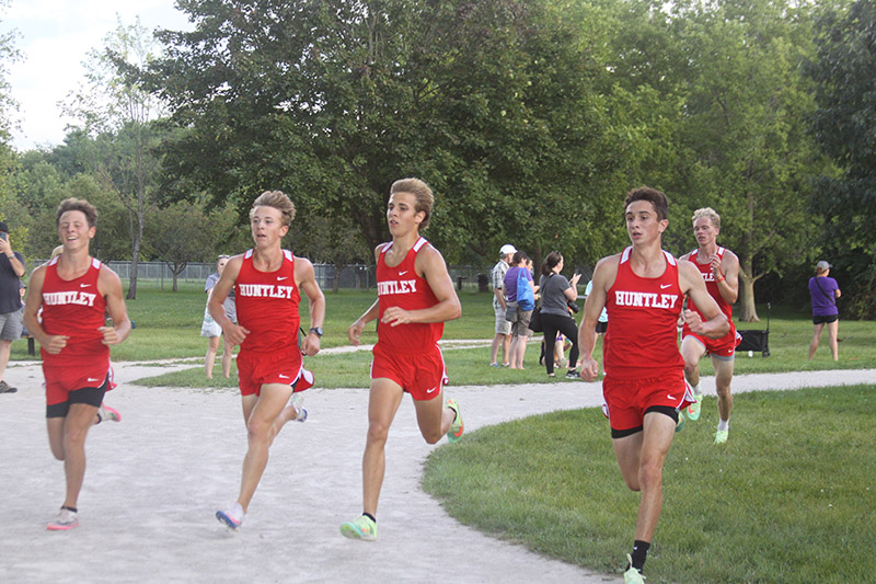 Huntley boys cross-country runners cross the finish line at the double dual meet Sept. 6. From left: Luke Grubbs, Zach Zuzzio, Tommy Nitz, Ty Rasmussen and Hudson Fisher.