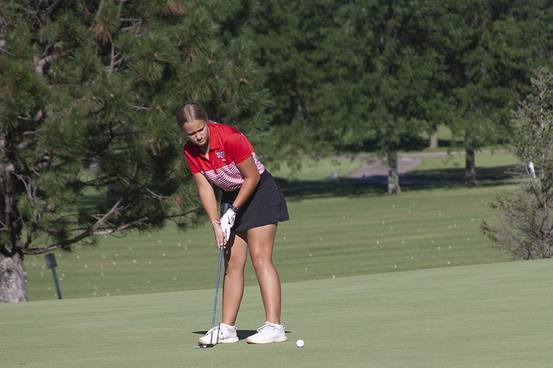 Huntley junior Aubrey Dingbaum concentrates on a putt during the Red Raiders match with Jacobs Aug. 31. HHS won the FVC dual match at Pinecrest Golf Club.