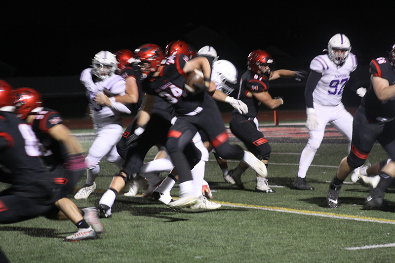 Huntley running back Haiden Janke carries the ball against Hampshire. He scored a touchdown as part of Huntley's 35-0 homecoming win.