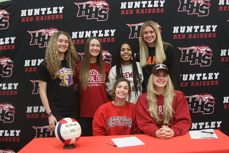 Huntley volleyball players were some of many HHS seniors to officially sign National Letters of Intent Nov. 9. Front row from left: Maggie Duyos, headed to Austin Peay University and Ally Panzloff, Brown University. Back row: Emily Willis, McHenry County College; Maddie Moran, Central College (Iowa); Ciera Fletcher, Edgewood College and Avary DeBlieck, Miami University.