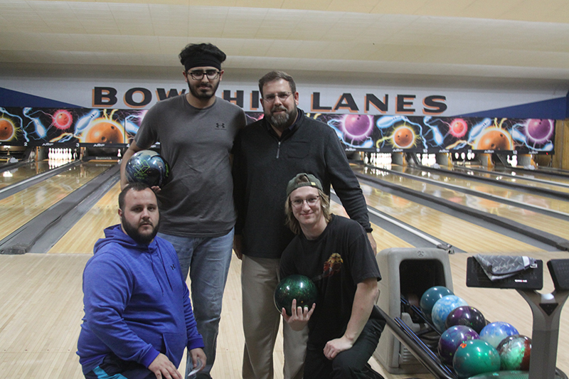 Huntley boys bowling team leaders are, front row, head coach Jacob Wagner and senior Caleb Vergona. Back row, senior Josh Waters and assistant coach Jason Waters.