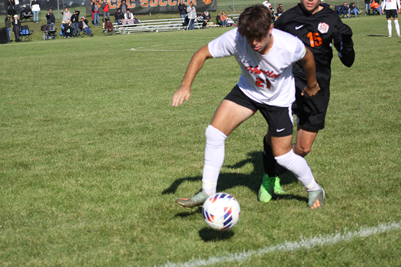 Huntley's Zach Heitkemper battles during a match this season.