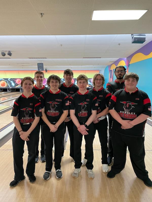 Huntley's boys bowling team celebrates its sectional bid at the IHSA Regional Jan. 14 at Mardis Gras Lanes in DeKalb. Front row from left to right: sophomore Landon Conforti, sophomore Matthew Fishman, sophomore Nicholas Gaspari, sophomore Joey Humphrey,. Back row: sophomore Nick Hoglind, sophomore Austin Tenglin, senior Caleb Vergona and senior Joshua Waters.