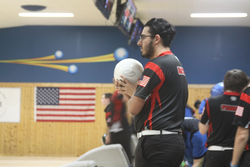 Huntley senior Joshua Waters concentrates before throwing a ball in a match. Huntley's boys bowling team qualified for this weekend's IHSA State Meet in O'Fallon.