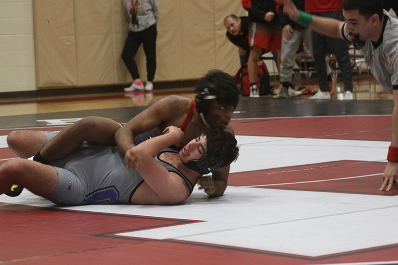 Aadi Patel competes at 182 pounds at Huntley’s senior night against Burlington Central Jan. 12.