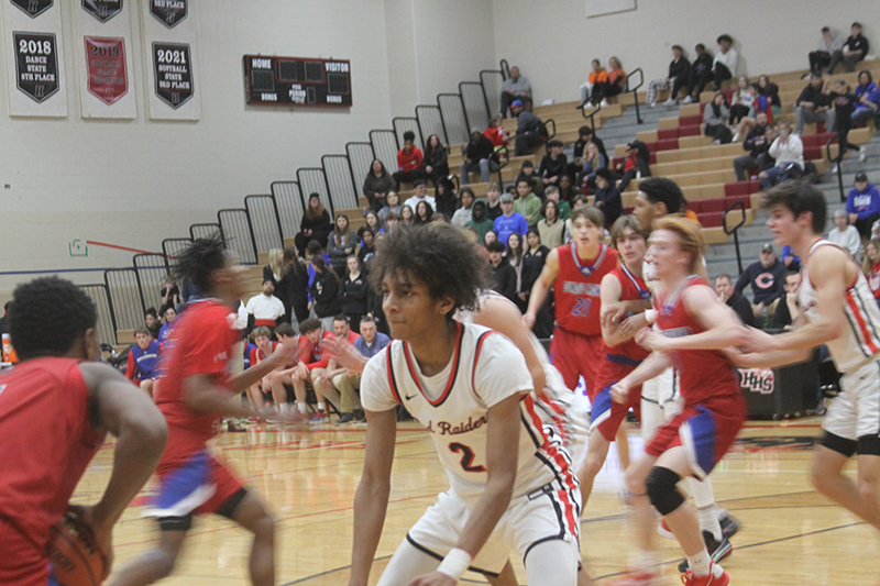 Huntley junior Omare Segarra plays good defense earlier this season against Dundee-Crown.