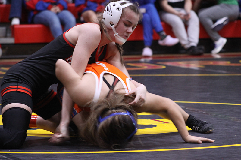 Aubrie Rohrbacher battles an opponent at the IHSA Girls Wrestling Sectional meet Feb. 10 in Schaumburg.