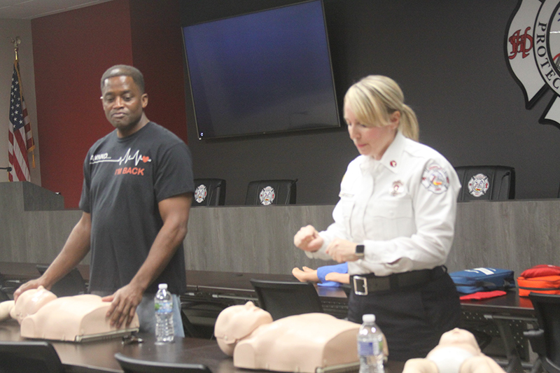 Carlos Spann, left, and Huntley Fire Protection District Lt. Kelly Gitzke, teach a CPR class to members of the Senior Volunteer Network of McHenry County.