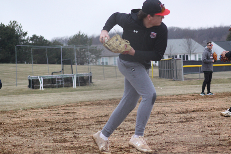 Huntley third baseman AJ Putty fields a ground ball during baseball practice.