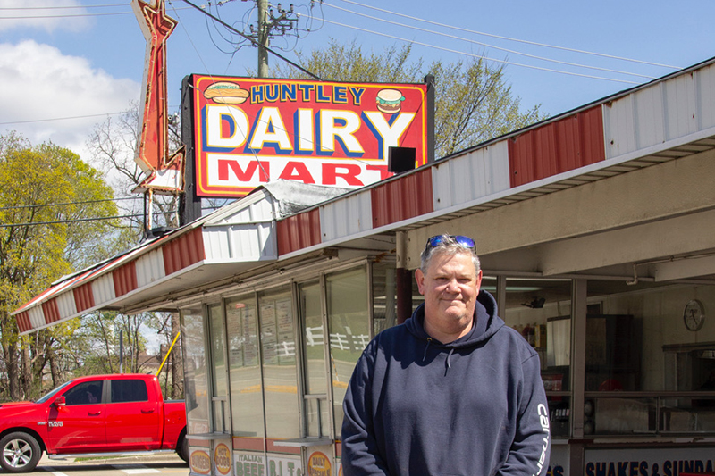 Bill Dunn is working on the opening at Huntley's Dairy Mart. Dunn and his wife Amy are the new owners.