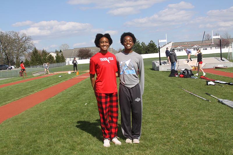 Huntley junior Dominique Jonson, left and senior Alex Johnson are contributors to the Red Raiders girls track and field team. Alex won state championships in the triple jump and long jumps last season. HHS will host the Fox Valley Conference girls track and field meet May 5.