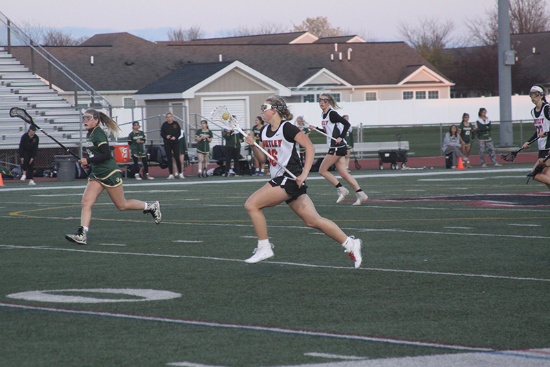 Huntley sophomore Katie Ferrara heads toward a shot on goal during a contest against Stevenson. Ferrara scored her 100th career goal April 28.