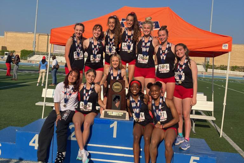 Huntley girls track and field team celebrates winning the Class 3A IHSA State Championship May 20 at Eastern Illinois University.