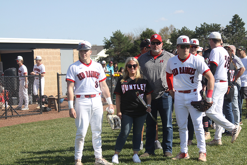 Huntley baseball team's 17 seniors and their parents participated in senior night May 4 before a game against Wauconda. From left: Brayden Bakes, mom Melissa Bakes, dad Chris Bakes and Ryan Bakes.