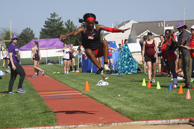 Huntley senior Alexandria Johnson completes an triple jump effort. She won the triple jump and long jump events at the HHS Class 3A IHSA Sectional May 10 to qualify for the state meet. She also will compete at state in the 100-meter run and 4x100-meter relay.