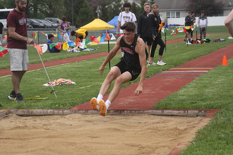 Huntley's Zach Rysavy aims for a strong finish in the triple jump at the Fox Valley Conference meet. He went on to finish fourth in the event at sectional.