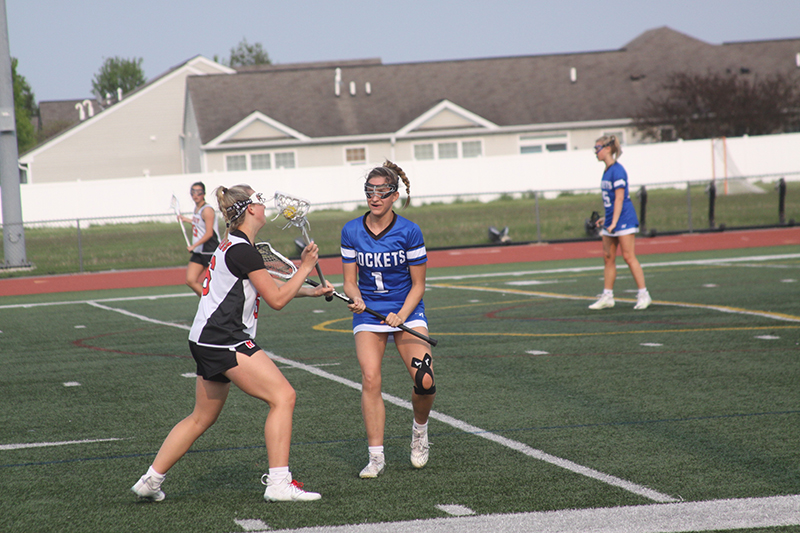 Katie Ferrara heads up field against Burlington Central. The sophomore finished the season as the Red Raiders' leading scorer with 67 goals.