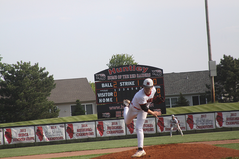 Huntley senior Andrew Ressler fires a pitch during the Red Raiders' 7-5 victory over Palatine May 22. Huntley ended the regular season with a 27-7 record.