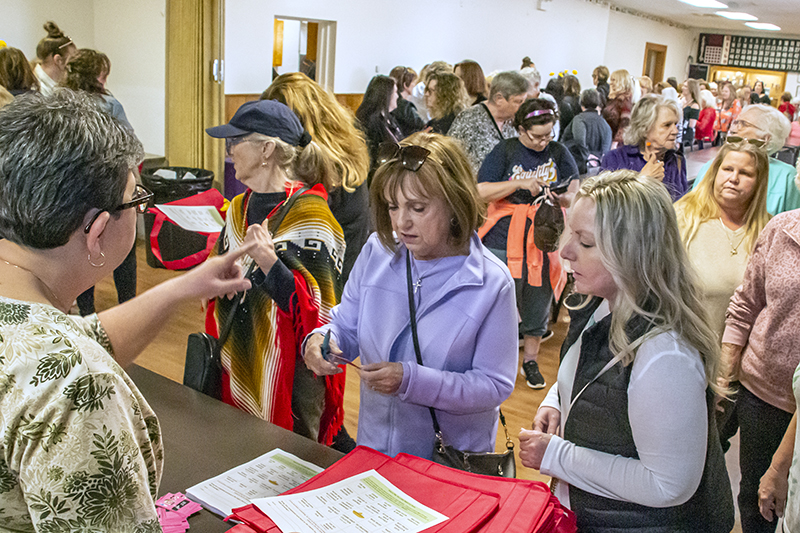 Participants sign up at the Huntley American Legion Hall for the May 4 Village of Huntley offered a Cinco de Mayo event themed Ladies Night Out