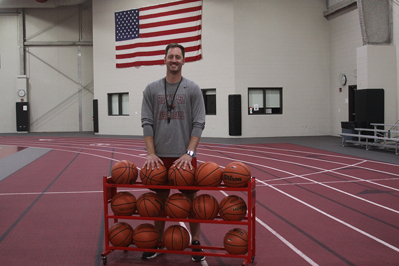 Huntley High School physical education teacher Collin Kalamatas will be the Red Raiders new head boys basketball coach this season.