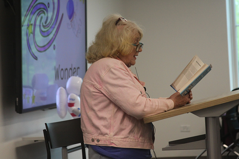 Huntley Park District Preschool Director Connie Lombard reads "Wonder!" during the Monday read aloud program of Raiders Read Together. Community leaders read to students at Huntley Area Public Library at 6 p.m. Mondays.