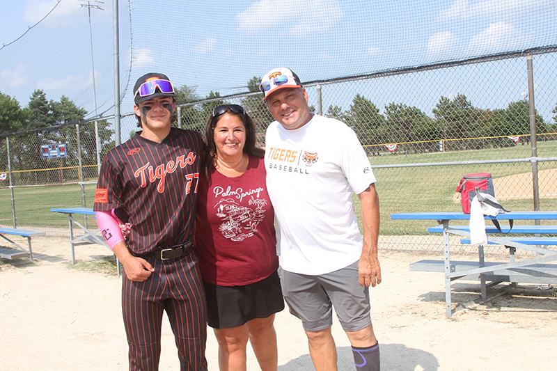 Josh, Faly and Steve Colaizzi of Bartlett enjoy a post-tournament moment at the McHenry County Youth Sports Association International Championships. Josh is recovering from a vision condition.