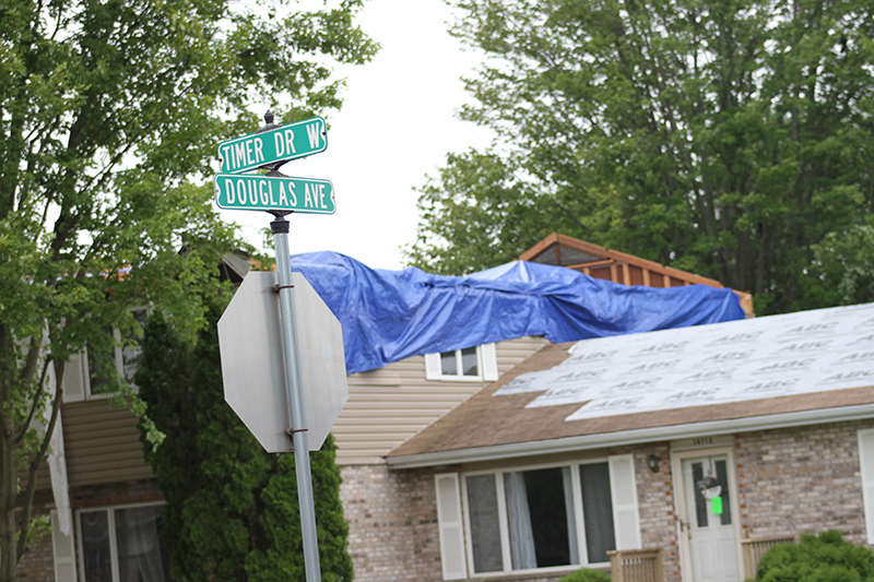 A tarp was placed at this multi-unit residential building after the severe storm July 12 at the 11700 block of Timber Road West in Huntley.