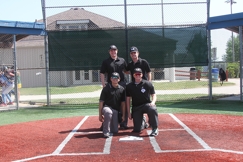 Four Class of 2023 Huntley High School baseball players were umpires at the McHenry County Youth Sports Association's international championships. Front row, Joey Garlin and Mike Dabe. Back, Vinny Costantino and Andrew Ressler.