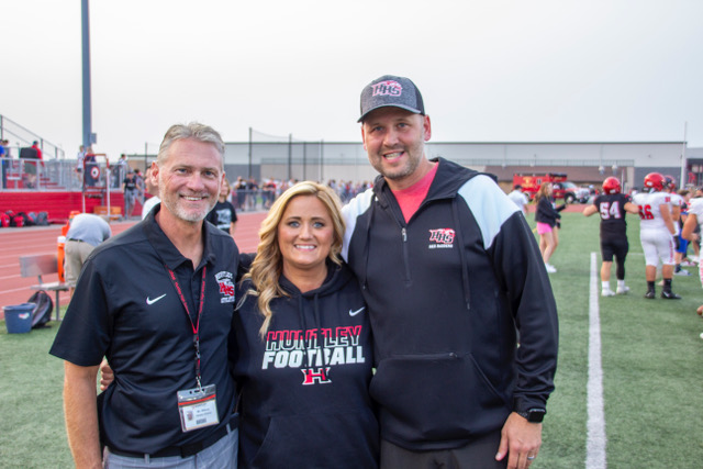 Huntley High School honored the family of Lucas Gidelski at the HHS Fall Sports Kickoff Aug. 18. From left: HHS Athletic Director Glen Wilson, Lucas' mom Kandice and dad David.