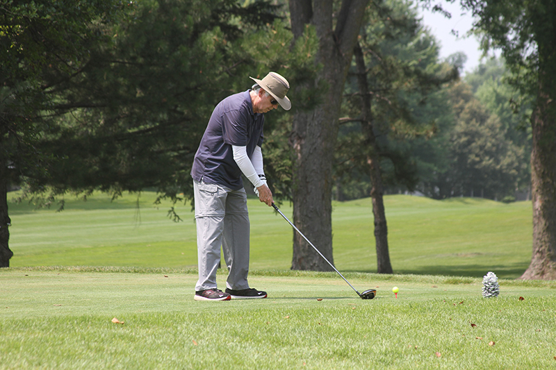 Ed Fahey, of Sun City, tees off in a mixed golf league held Tuesdays at Pinecrest Golf Club.