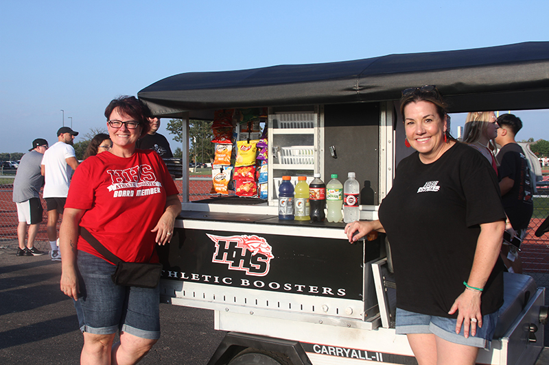 Huntley High School Athletic Boosters Melanie Ottavino, left and President Shannon Corso with the Boosters' mobile concession stand.