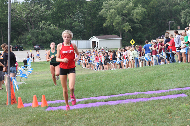 Huntley cross country runner sophomore Cori Klivinger races to the finish.