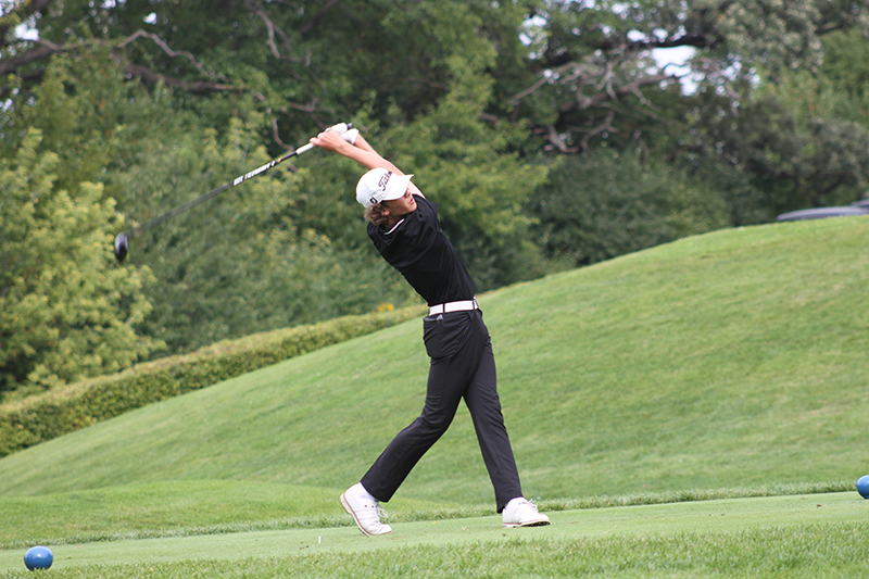 Huntley senior golfer Nathan Elm concentrates on a tee shot at the Dundee-Crown Invitational Sept. 16.