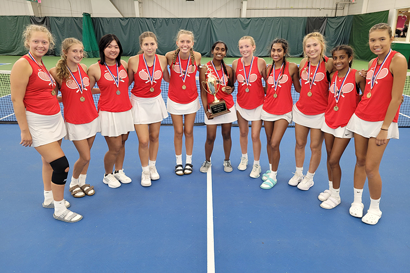 Huntley girls tennis team celebrates its Fox Valley Conference tournament championship. From left, Carlie Weishaar, Ellie Pauwels, Trinity Nguyen, Shea Nagle, Kate Burkey, Vinuthna Depala, Ella Doughty, Ari Patel, Julie Klockner, Gia Patel and Ashley Phommasack.